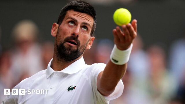 Novak Djokovic serves