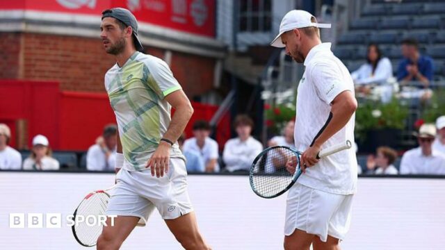 Lloyd Glasspool and Julian Cash during the men's doubles final match against Nikola Mektic and Michael Venus at Queen's 