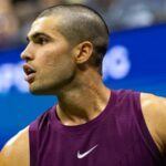 Alcaraz oslavuje proti Reilly Opelke.