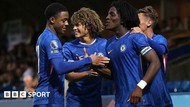 Ryan Kavuma-McQueen celebrates a Chelsea goal against Manchester City with Shumaira Mhueka
