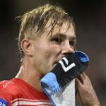 George Illawarra Dragons vpred Jack de Belin sa vracia na súd, aby čelil bývalému policajnému dôstojníkovi, ktorý priznal klamstvo počas svojho sexuálneho útoku