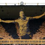Fanúšikovia Wolverhampton Wanderers odhaľujú Diogo Jota Tifo pred zápasom Manchester City.