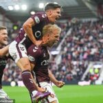Harry Milne spravuje oslavy po tom, čo viedol k Aberdeenu v Tynecastle