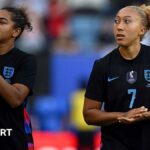 Jess Carter and Lauren James clapping the fans after an England game
