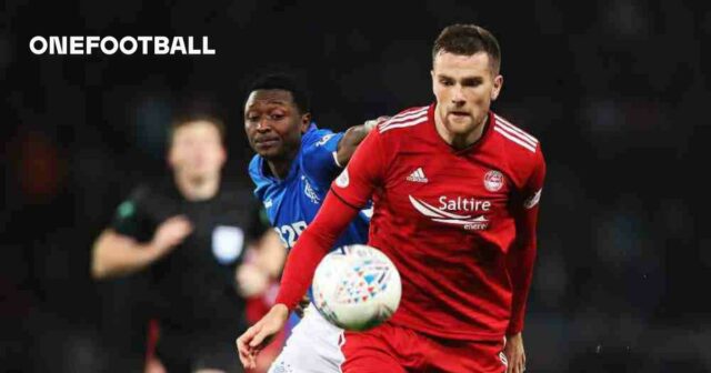 Michael Devlin, keď zastupuje Škótsko pod Steve Clark, Aberdeen a spolupracuje s PFA Scotland

