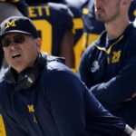 Michigan zasiahol hlavnú pokutu, Harbaugh's NCAA Exile predĺžil o 10 rokov