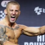 Oban Elliott poses at a weigh-in