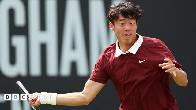 Coleman Wong hits a forehand at the US Open