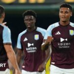 Villa players celebrating after scoring