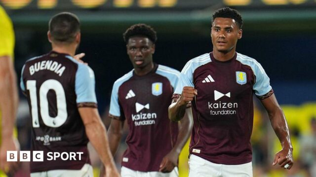 Villa players celebrating after scoring 