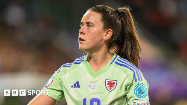 Esther Morgan wears a green Wales team shirt