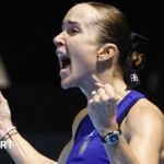 Ukraine's Elina Svitolina yells in celebration after winning her Billie Jean King Cup match against Spain's Paula Badosa