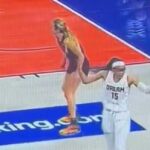 Allisha Gray bola videná, ako sa v utorok dostal do vyhrievanej výmeny s fanúšikom Indiana Fever Fan