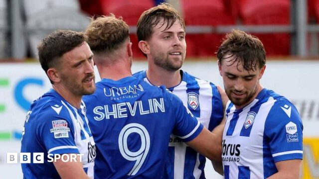 Coleraine players celebrate Will Patching's opening goal