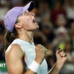 Iga Swiatek yells in celebration after beating Ekaterina Alexandrova to win the Korea Open