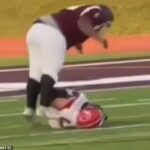 Futbalový hráč Michigan Junior Varsity vyskočil na súpera vo štvrtok a zlomil si jeho chrbticu