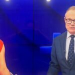 Kanál Ten NewsReader Hugh Riminton (na obrázku s spoluorganizáciou Amelia Brace) nesprávne vypredal priezvisko Izáka Quaynoru tým najhorším spôsobom, keď predstavil príbeh o hviezde AFL, ktorý bol chytený v škandálnom homofóbnom zneužívaní ligy