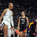 Las Vegas Aces Center A'ja Wilson (22) reaguje po bodovaní proti Phoenixovej ortuti
