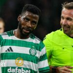 Kelechi Iheanacho talks to referee Tobias Stieler