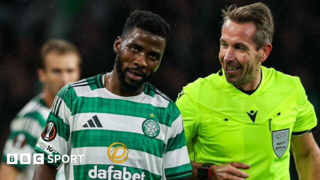 Kelechi Iheanacho talks to referee Tobias Stieler