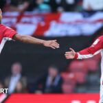 Zak Vyner and Anis Mehmeti high five playing for Bristol City