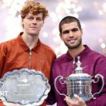 Jannik Sinner and Carlos Alcaraz show off their trophies after the US Open