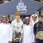 Jannik Sinner holds the Six Kings Slam trophy after his victory over Carlos Alcaraz in the 2024 final