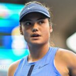 Emma Raducanu waits to receive serve during the China Open