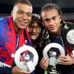 Kylian Mbappe and his brother Ethan along with their mother