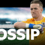 Harry Kane claps while playing for England