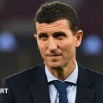 Javi Gracia wearing a shirt and tie