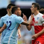 Joey Barton satirizuje Transplantáciu vlasov Wayne Rooney uprostred teórie konšpiračného konšpirácie v Manchestri.