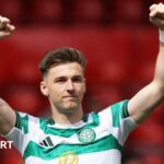 Kieran Tierney salutes Celtic supporters at Pittodrie on 10 August