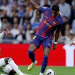 Eduardo Camavinga z Realu Madrid, Marcus Rashford z FC Barcelona, ​​​​Eder Militao z Realu Madrid počas zápasu LaLiga EA Sports medzi Real Madrid a FC Barcelona na Estadio Santiago Bernabeu