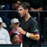 Cameron Norrie punches his fist in celebration