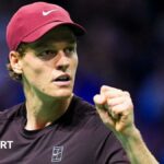 Jannik Sinner clenches his fist during his win over Ben Shelton at the Paris Masters in 2024