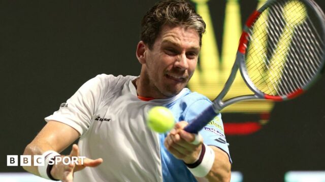 Cameron Norrie hits a forehand during the Shanghai Masters