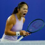 Mimi Xu celebrates after winning a point