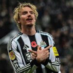 Nick Woltemade oslavuje