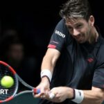 Troy Deeney and Moises Caicedo