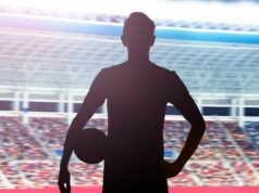 Hviezda Premier League sa „vyhrážala zbraňou na rušnej londýnskej ulici špičkovým futbalovým agentom“ Silueta muža kráčajúceho smerom k svetlu