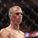 Ian Machado Garry (vľavo) počas svojej jedinej prehry, bodovej prehry od Shavkata Rakhmonova (Getty Images)