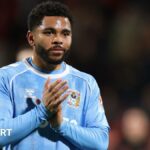 Jay Dasilva claps the crowd after a game for Coventry City