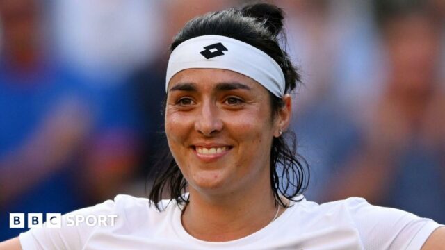 Ons Jabeur celebrates while competing at Wimbledon