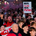 Salford Red Devils fans protest before their game against St Helens towards the end of the 2025 season