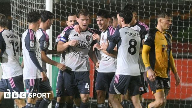 Exeter City captain Ed Turns celebrates his winning goal against Newport 