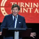 Spomienková slávnosť za zabitého konzervatívneho aktivistu Charlieho Kirka na štadióne štátnej farmy – Zdroj: Getty