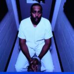 Bývalý tréner Michiganu Sherrone Moore obvinený zo spáchania troch trestných činov