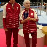 Olga Belooussov bola zbavená siedmich obvinení zo šikanovania zo strany vtedy 17-ročnej gymnastky, ktorú trénoval tréner a jej manžel Sasha (obaja na obrázku).