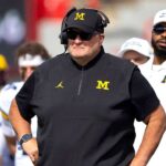 Hráči Michiganu sa cítia zradení po škandále Sherrone Moore, hovorí Poggi